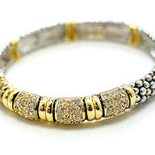 Gorgeous - swank Gold and silver design in metal and crystals. Stretch fit all!