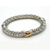 7253 $18 Designer a whats his name... two tone  white and yellow gold, a heavy  bangle