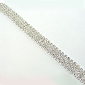 This delicate 4 row clasp fine rhinestone link bracelet