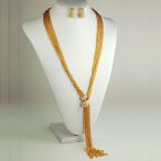  Gold multi chain tassel with clasp necklace 25in long with 3in ext and then there is the 6 inch tassel