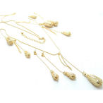 Very stylish 36 inch long gold metallic bead necklace and earrings