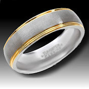 Tungsten Carbide 11 grams with 14k yellow gold edging this stunning ring