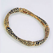 8192 $30 Beautiful black and gold stretch engraved bracelet