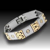 8236 $ 40 Two tone gold stainless steel 56grams, fold over clasp 14mm wide 8in long 12.5mm deep